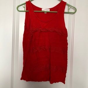 Red tank with fringes